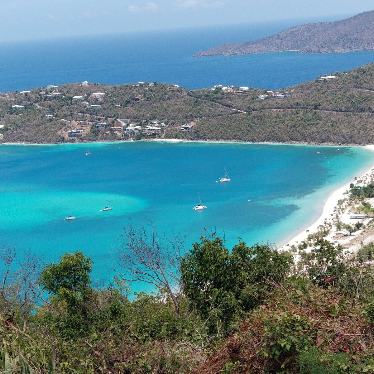 Panoramic overlook of turquoise Magens Bay from Drake's Seat in St. Thomas